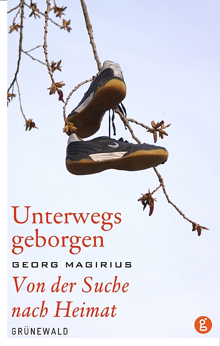 Sportschuhe hängen im Frühlingsgeäst - Cover des Buches "Unterwegs geborgen" von Georg Magirius